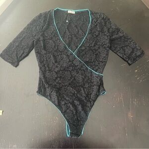 Free People black lace deep v neck bodysuit thong lingerie with blue trim NWOT